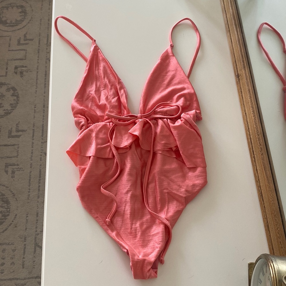 Tularosa pink once piece swimsuit. Size small. Worn once